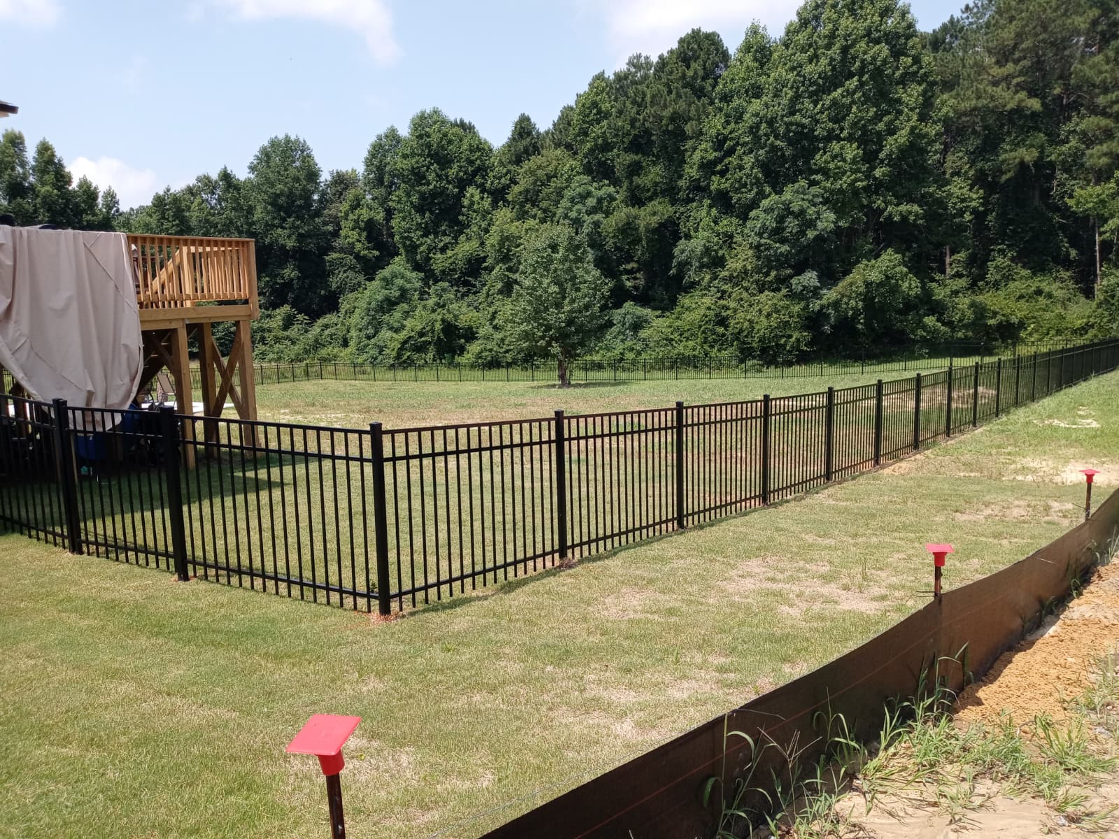 Black aluminum fence installation