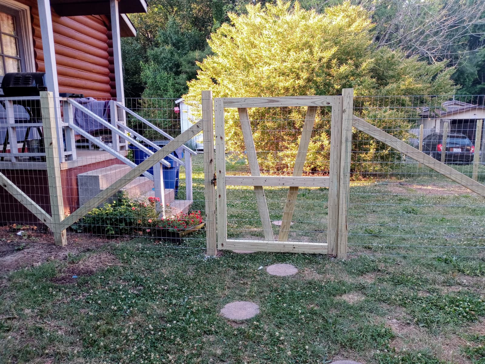 Wood framed wire fence and gate installation